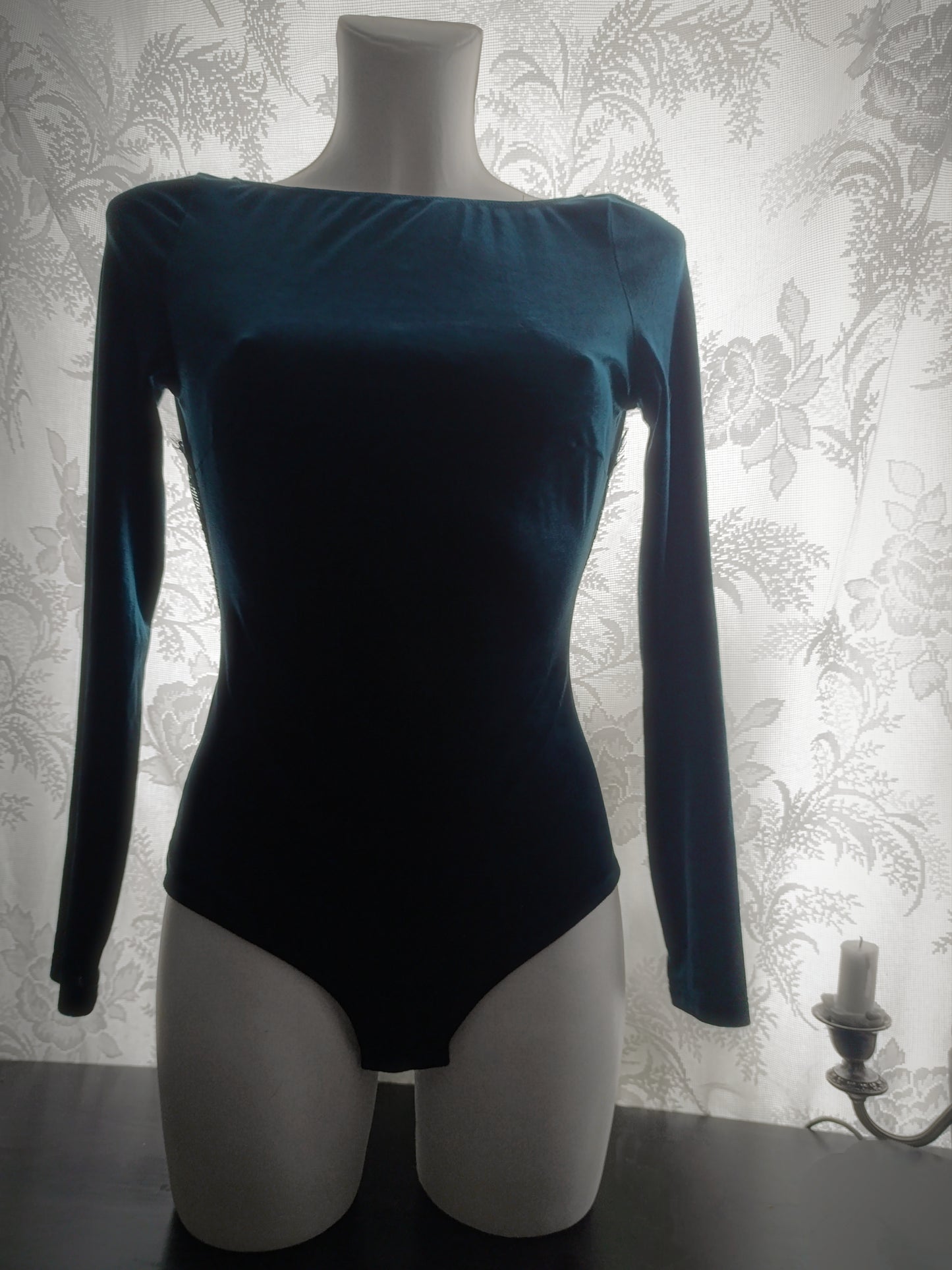 Velvet bodysuit with a large cutout on the back