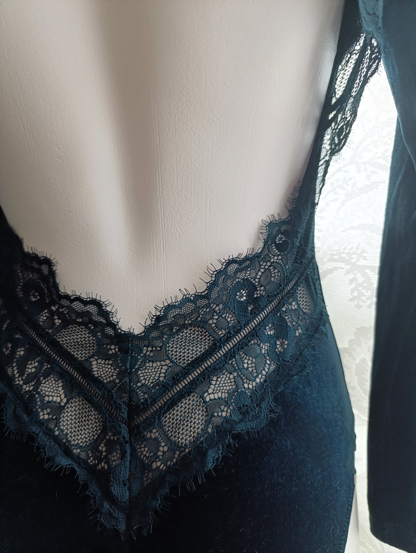 Velvet bodysuit with a large cutout on the back