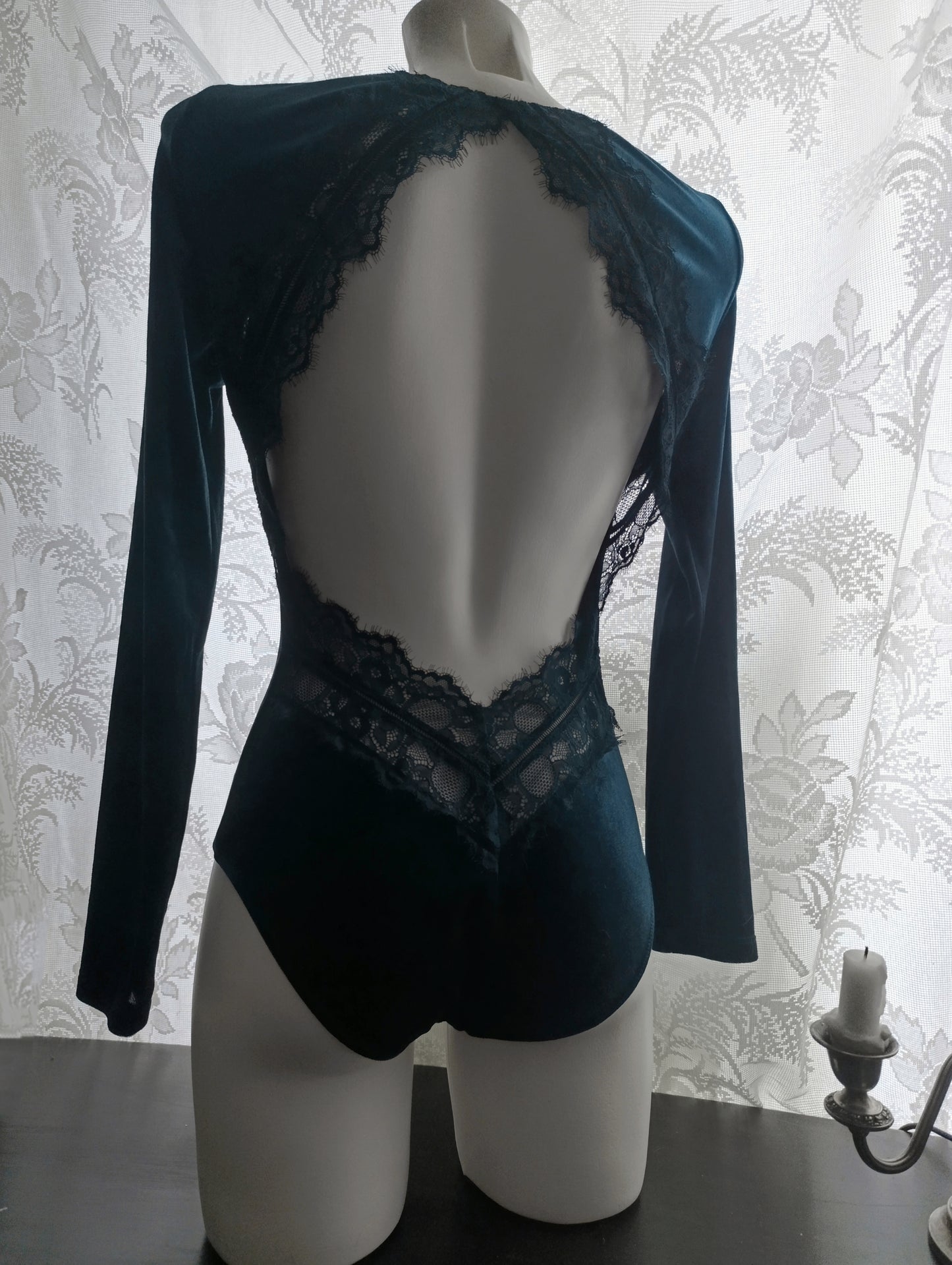 Velvet bodysuit with a large cutout on the back