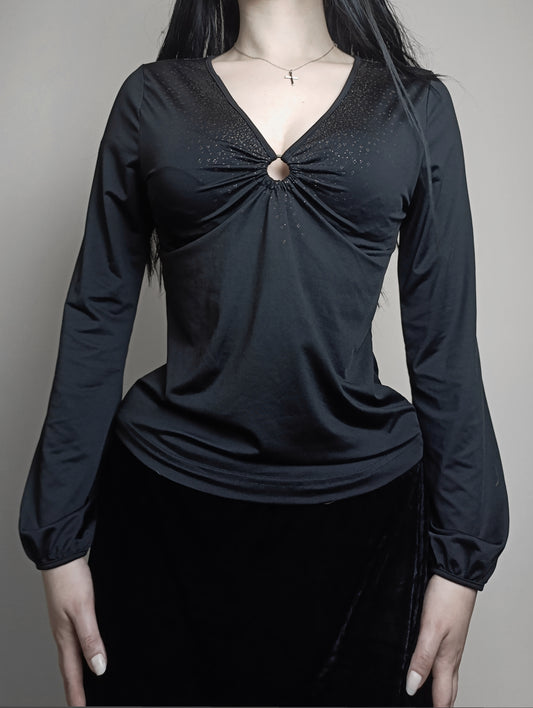 Blouse with glitter details and metal ring