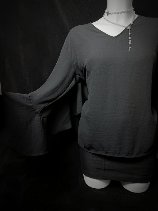 Black blouse with wide sleeves and ruffles